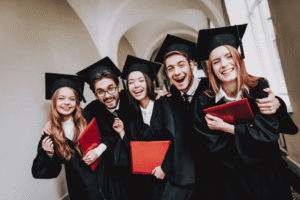 a group of people in graduation gowns and caps in UBC Outstanding Intl Student Award 2024